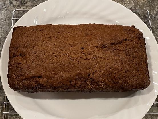the cake out of the pan and onto a plate on a cooling rack