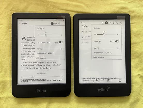 Photo of the two book readers side-by-side, unlocked and their similar looking display settings menu open
