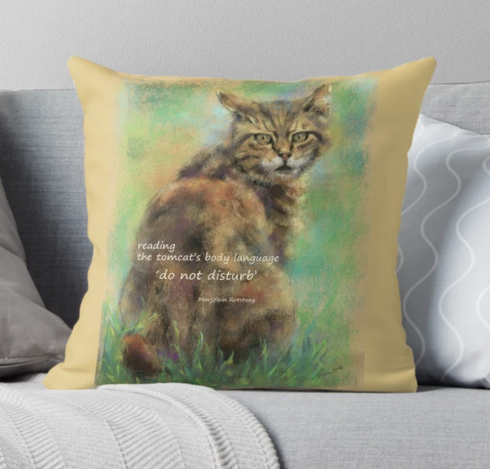 Throw pillow featuring the haiku 
reading
the tomcat’s body language
‘do not disturb’

Combined with 'The portrait of a sitting cat' hand-painted pastel painting by the artist Karen Kaspar. A brown and red tabby cat sits in the green grass with its back to the viewer and its head turned backwards. It is looking directly at the viewer.