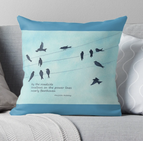Throw pillow featuring the haiku 
by the roadside
swallows on the power lines
nearly Beethoven

Combined with the 'Gathering of Swallows' hand painted watercolour painting in landscape format by the artist Karen Kaspar. Swallows have gathered on three power lines in front of a blue sky with white clouds. The silhouettes of the birds in dark indigo blue stand out clearly against the sky. Some of the swallows are sitting on the wires and appear to be having a chat. Others are flying in to attend the meeting. Others are already taking off.
