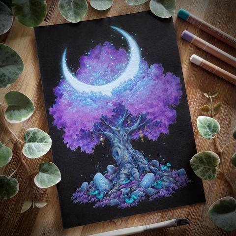 A photo of a portrait-format painting on black paper, placed on a wooden table and surrounded by coloured pencils, a paint brush, and leaves for decoration. The painting features a maple tree with soft, warm purple foliage, a white, glowing sickle moon stuck in its crown. At its base, rune stones showing moon phases are scattered among purple grass and rounded teal green leaves. A few golden charms hang from the tree‘s branches.