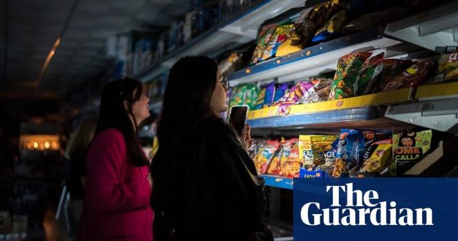 Blackouts tip Spain and Portugal into darkness – in pictures | Art and design